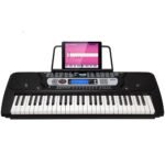 Oferton: RockJam Piano con teclado de 54 teclas con fuente de alimentación, soporte para partituras, pegatinas para notas y lecciones de piano.